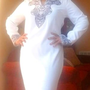 White long sleeve dress.